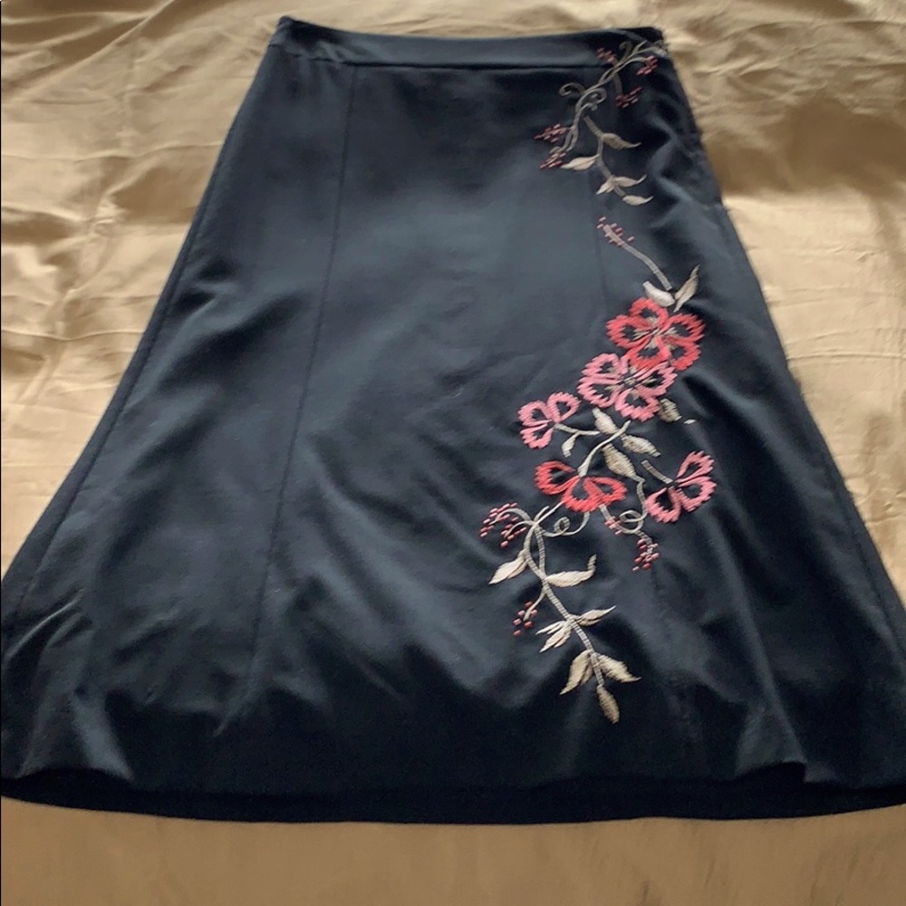 Black pencil/A-line skirt, red/pink embroidery